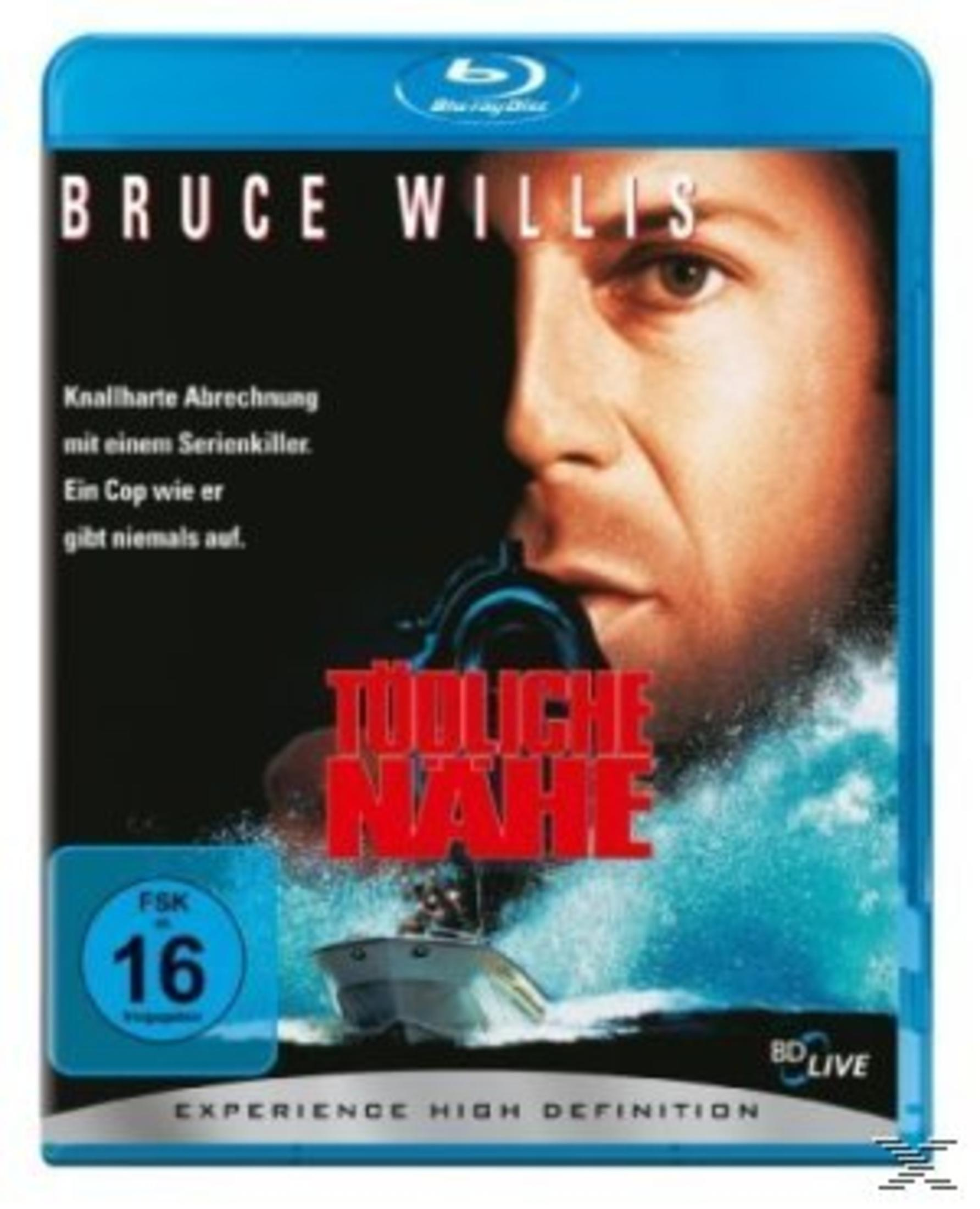 Couverture Blu-ray : Bruce Willis avec pistolet, bateau sur l'eau, FSK 16.