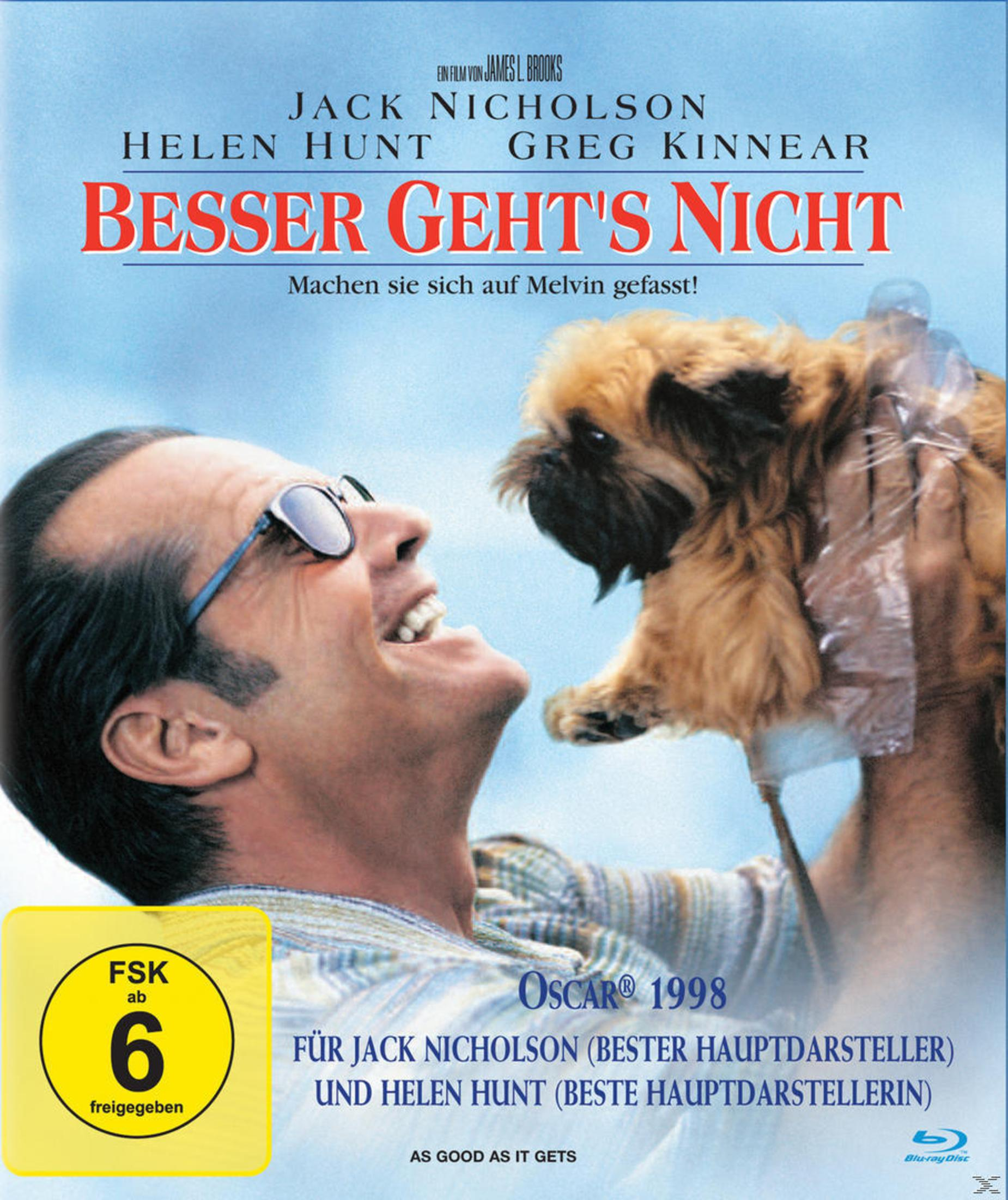 Jack Nicholson rit en tenant un chien. Affiche de film.