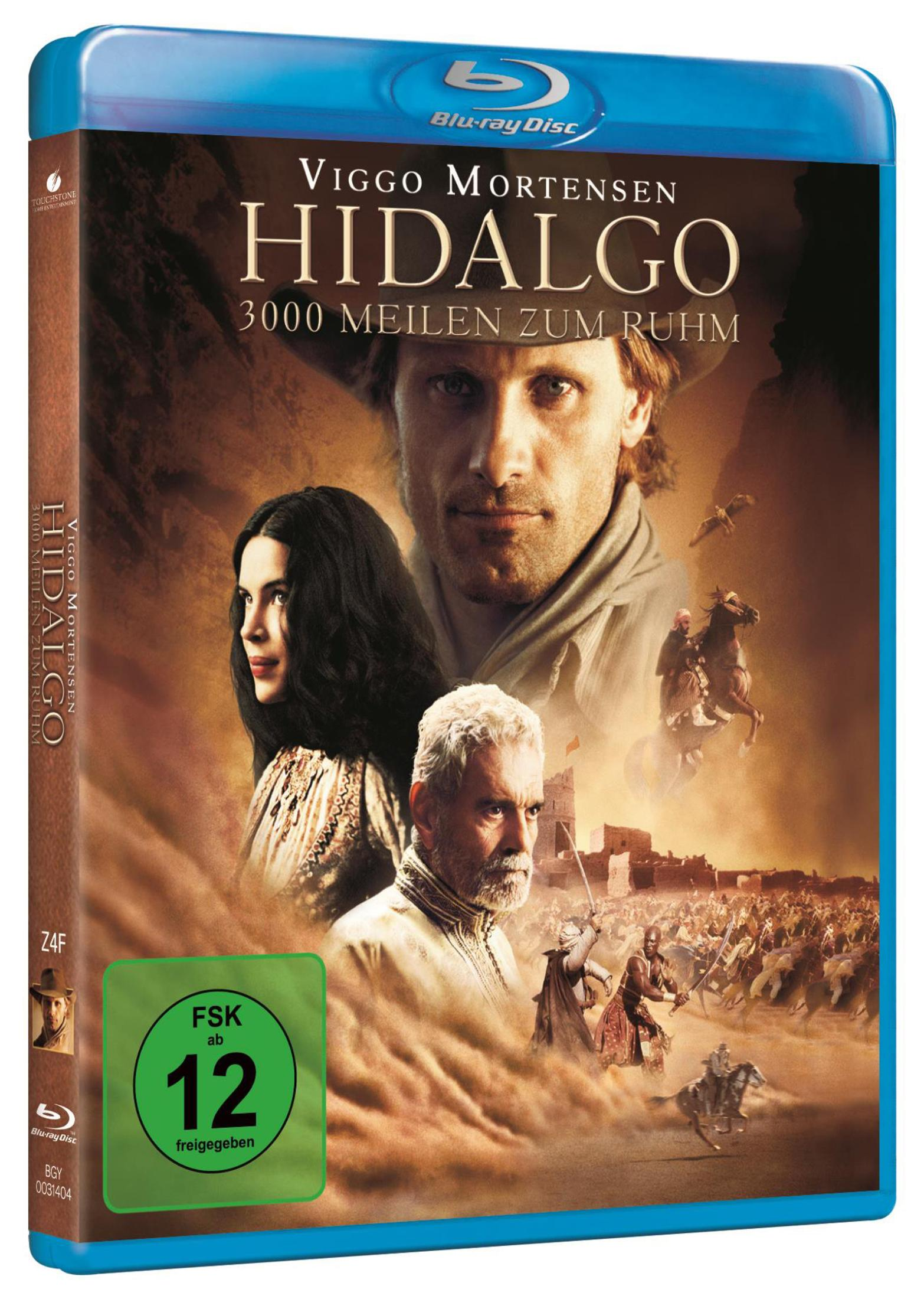 Das Blu-ray-Cover für "Hidalgo" zeigt Viggo Mortensen und eine Wüstenszene mit Reitern und Gebäuden im Hintergrund.