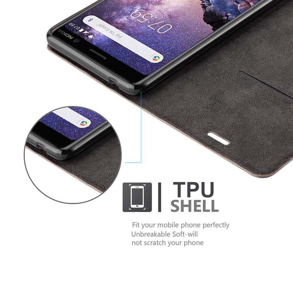 Schwarzes Telefon in einer Hülle, das Display zeigt die Uhrzeit und ein Bild. TPU SHELL Text.