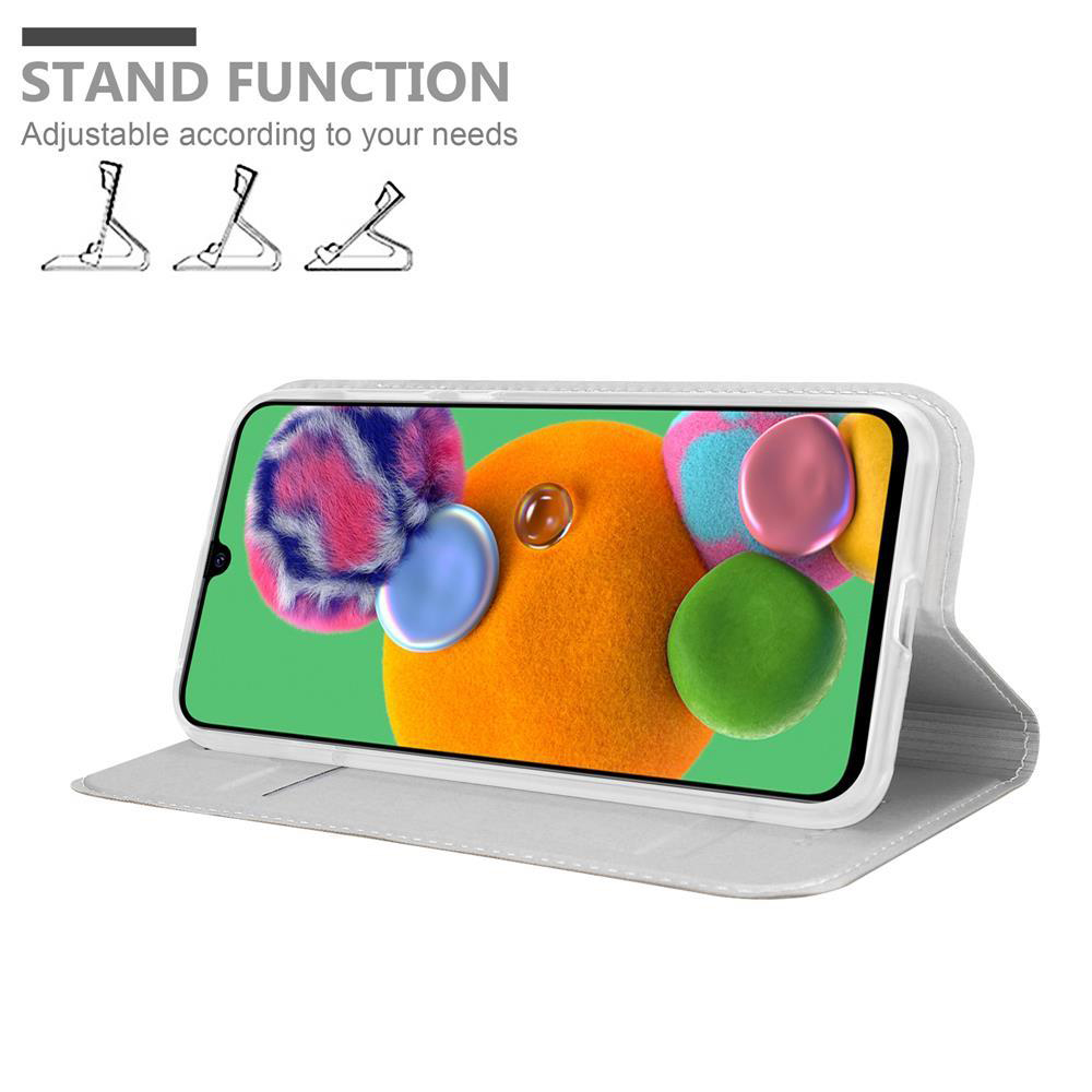 Handyhülle mit Telefon, in Ständerposition. Der Bildschirm zeigt bunte abstrakte Formen, weißer Hintergrund.