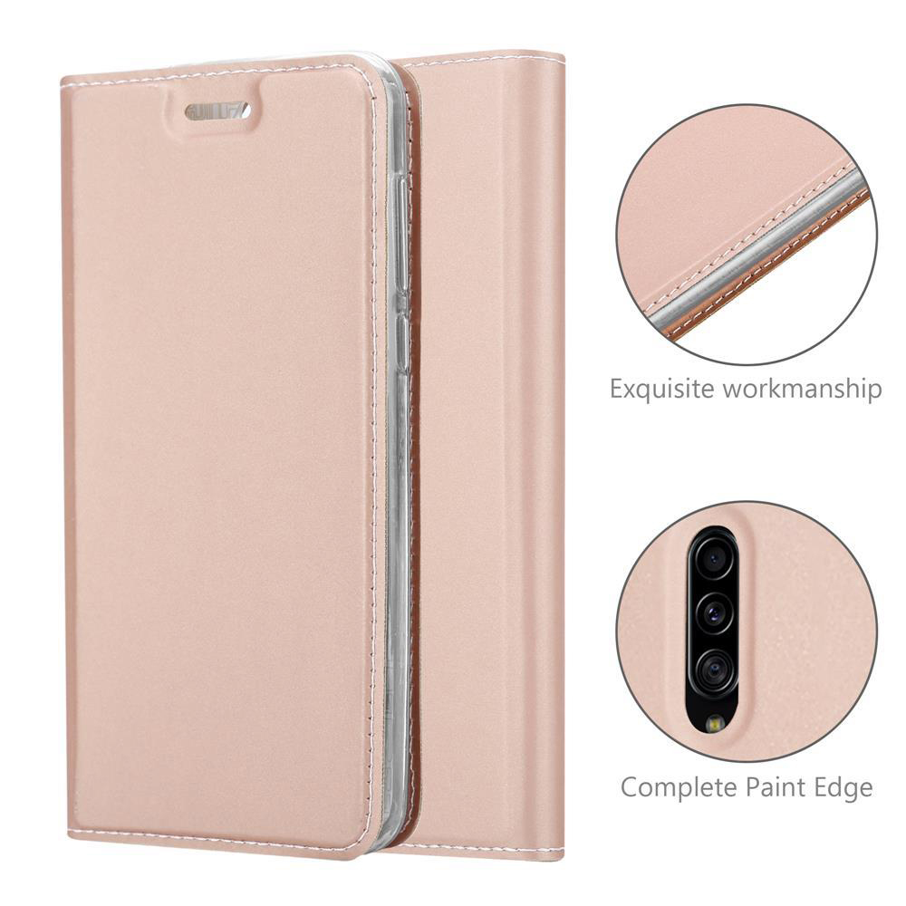 Custodia per telefono rosa. Due parti aperte. Esecuzione squisita e dettagli del bordo verniciato.