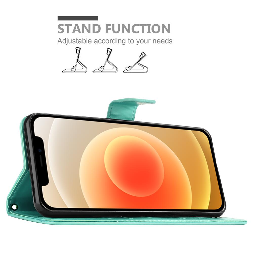 Un telefono in una custodia a portafoglio color verde acqua, che mostra uno schermo con sfondo arancione.