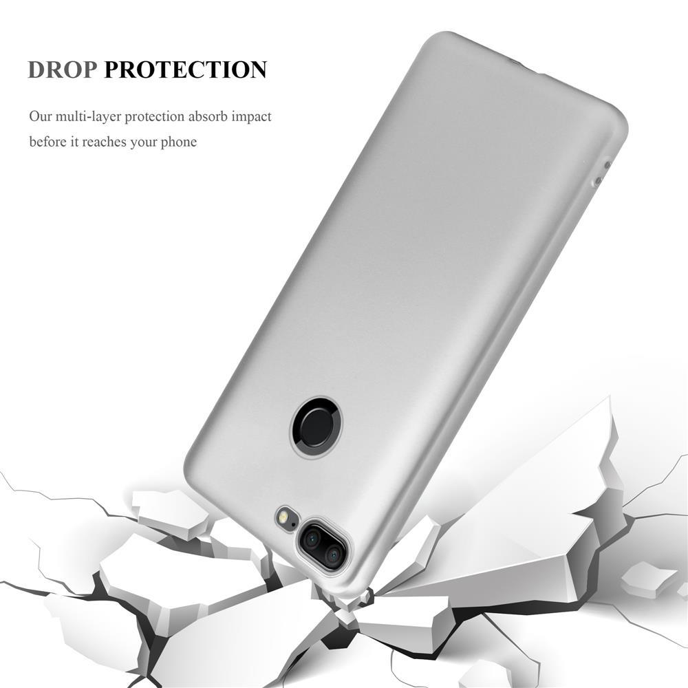 Una funda plateada para teléfono rompe una superficie, con texto de protección contra caídas.