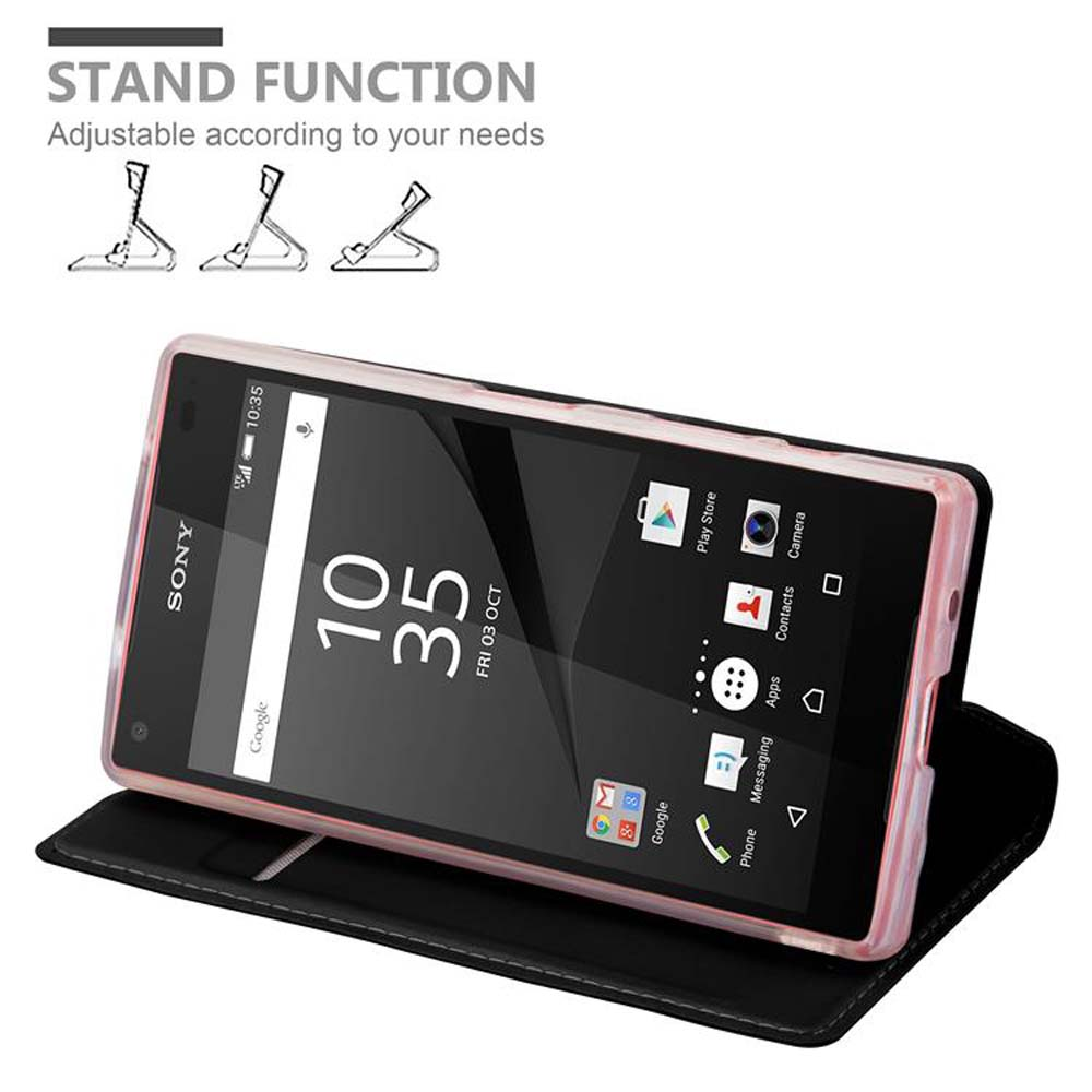 Ein Telefon in einer Hülle, das die Uhrzeit und Apps anzeigt. Die Hülle ist schwarz und pink.