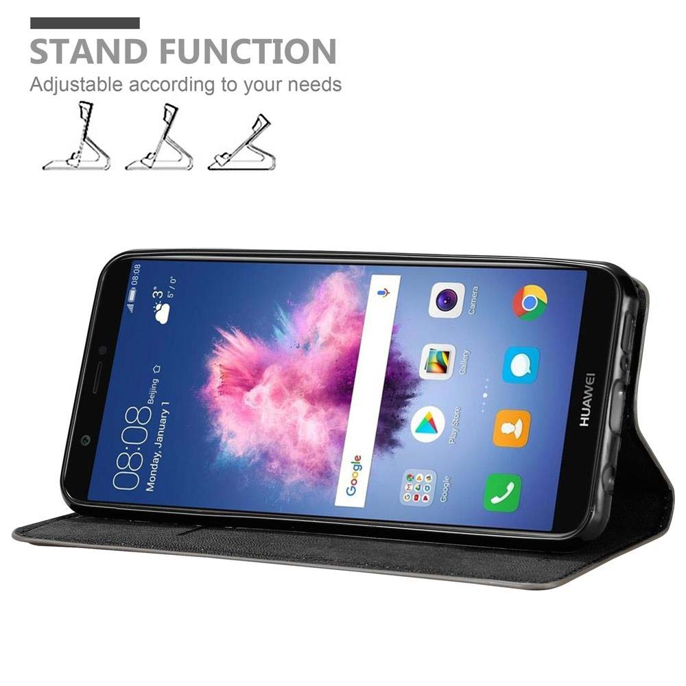 Un telefono in una custodia nera. Lo schermo mostra una schermata iniziale con icone. Il telefono è su un supporto.