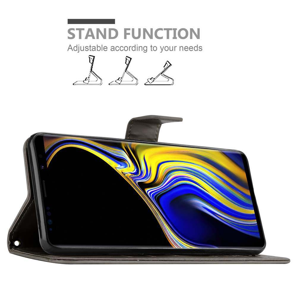 Telefono in una custodia in pelle marrone con funzione stand. Testo: Funzione stand.