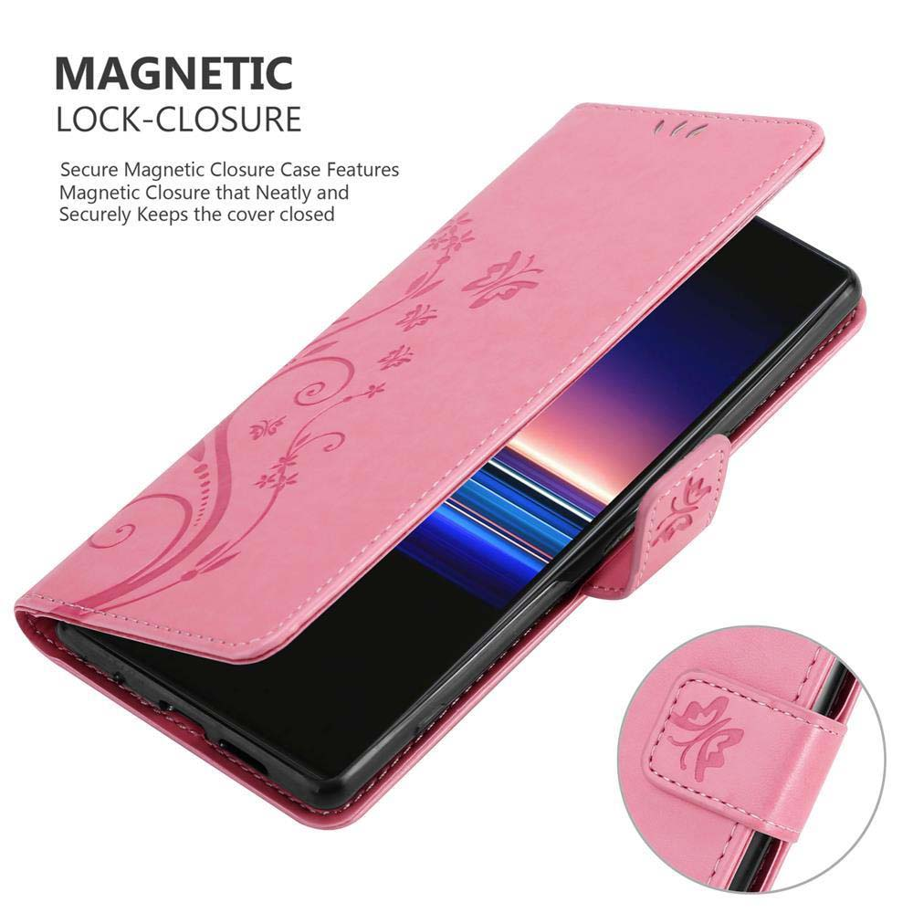 Custodia rosa con motivo floreale, aperta per rivelare un telefono. Testo: Chiusura magnetica. Chiusura magnetica visibile.