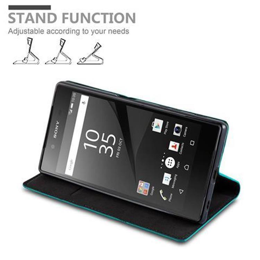 Un teléfono en una funda apoyado, mostrando la hora y las aplicaciones. La funda es negra con el interior verde azulado.