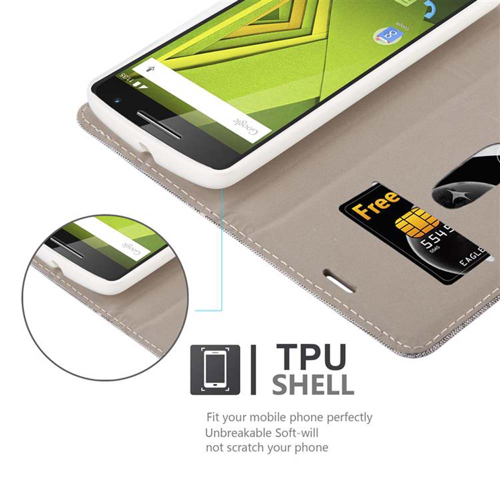 Telefono in custodia aperta. Lo schermo del telefono è visibile. Testo: 'TPU SHELL'.