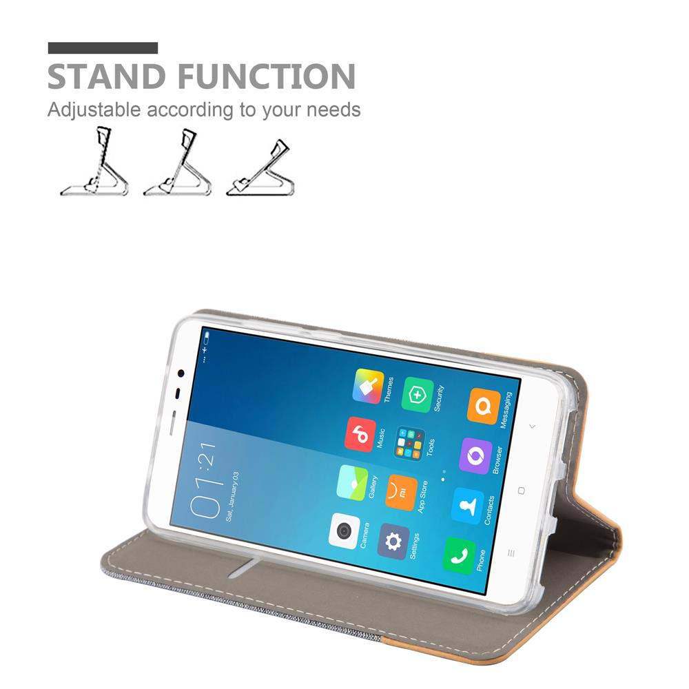 Eine Handyhülle mit einem Telefon und einem Telefonständer. Das Telefon zeigt den Startbildschirm.
