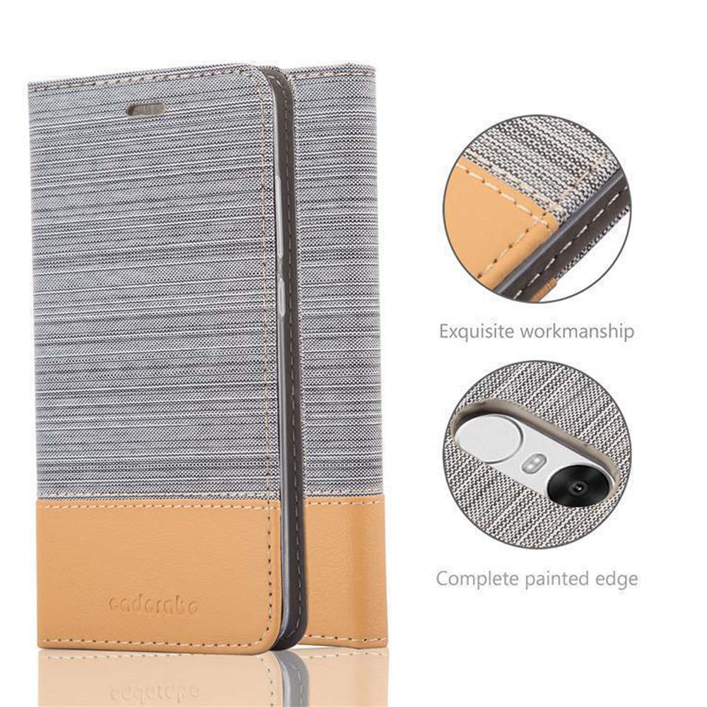 Handyhülle mit grauem Stoffdesign und Lederboden, das Telefon zeigend.