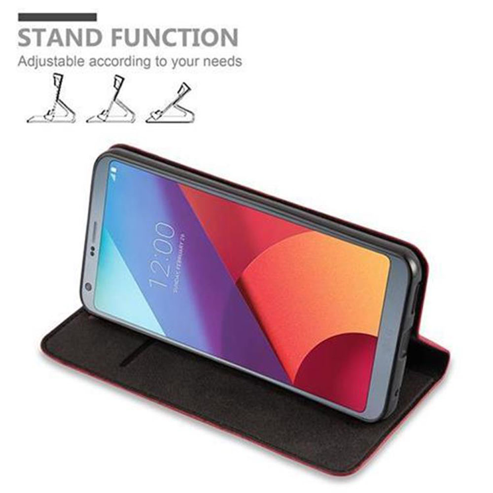 Ein Telefon in einer schwarzen Hülle auf einer weißen Oberfläche mit einer Standfunktion mit einstellbaren Winkeln.