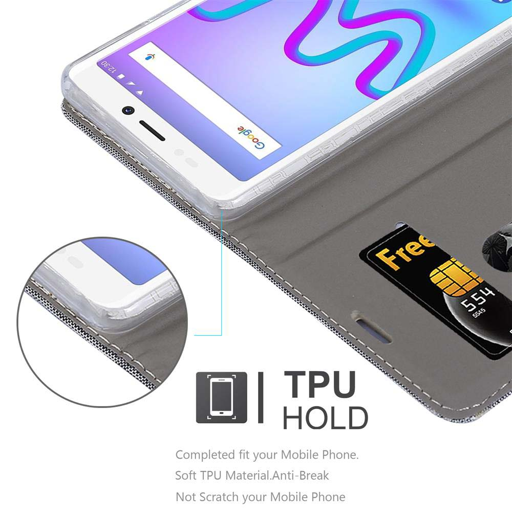 Telefon und Karte in einem Gehäuse. Text lautet 'TPU HOLD'. Das Telefon zeigt die Zeit.