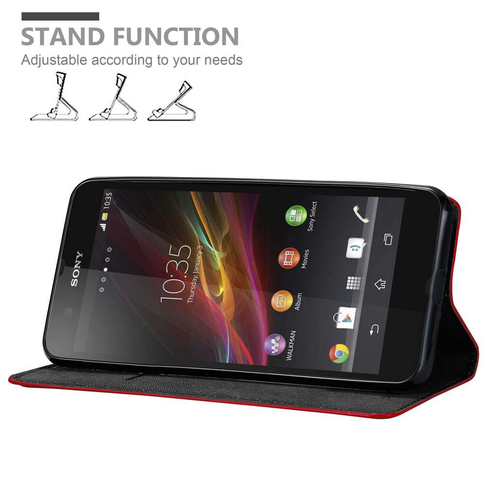 Un teléfono en una funda roja, abierto, de pie. Se muestran tres iconos de función de soporte arriba.