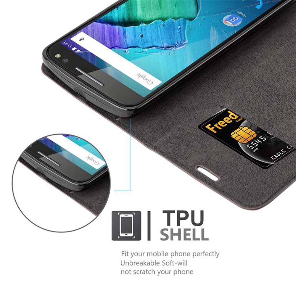 Un telefono in una custodia, aperto. Sono visibili uno slot per schede e una carta di credito. Il testo 'TPU SHELL' è presente.