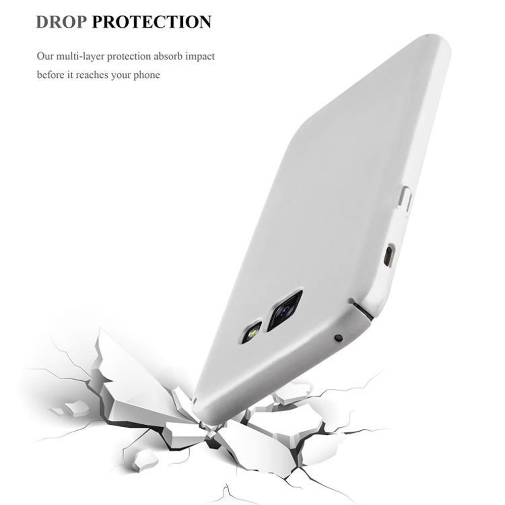 Una custodia bianca per telefono che cade, rompendo il terreno sottostante, concetto di protezione dalle cadute.
