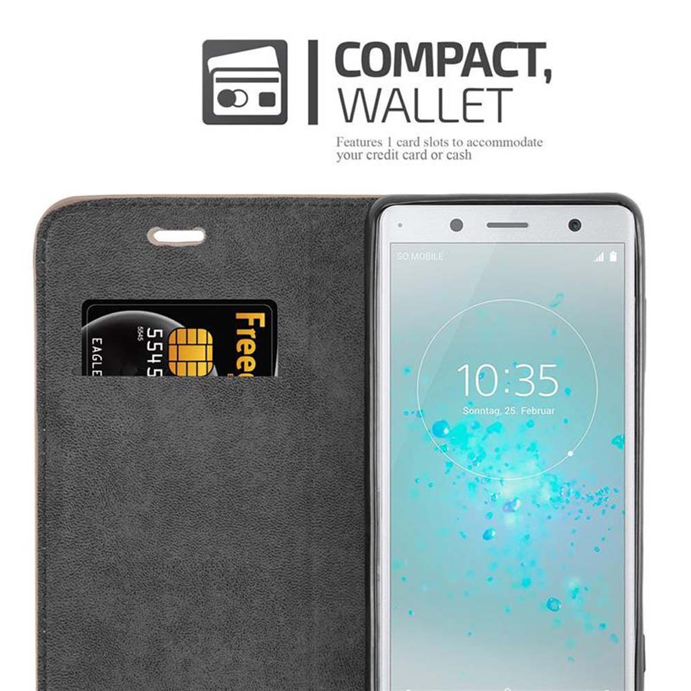 Custodia per telefono con design a portafoglio, una carta di credito e un telefono a destra.