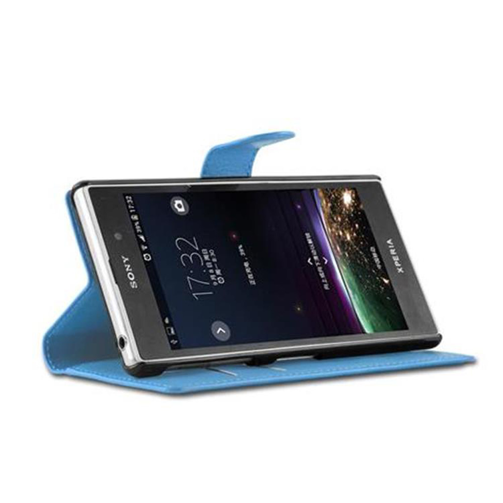 Ein Telefon in einer blauen Hülle, geöffnet, um den Bildschirm anzuzeigen. Die Hülle liegt auf weißem Untergrund.