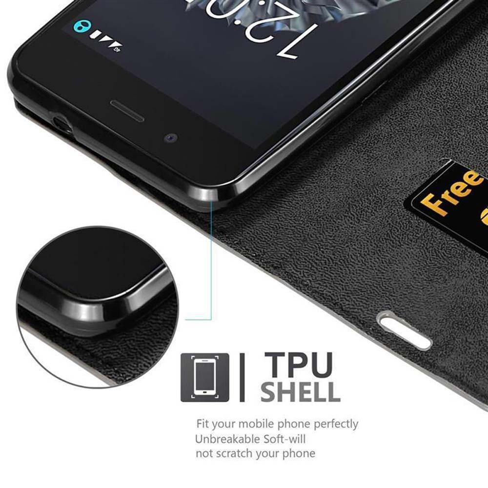 Teléfono negro en una funda negra, con ranura para tarjeta de crédito. Texto: TPU SHELL.
