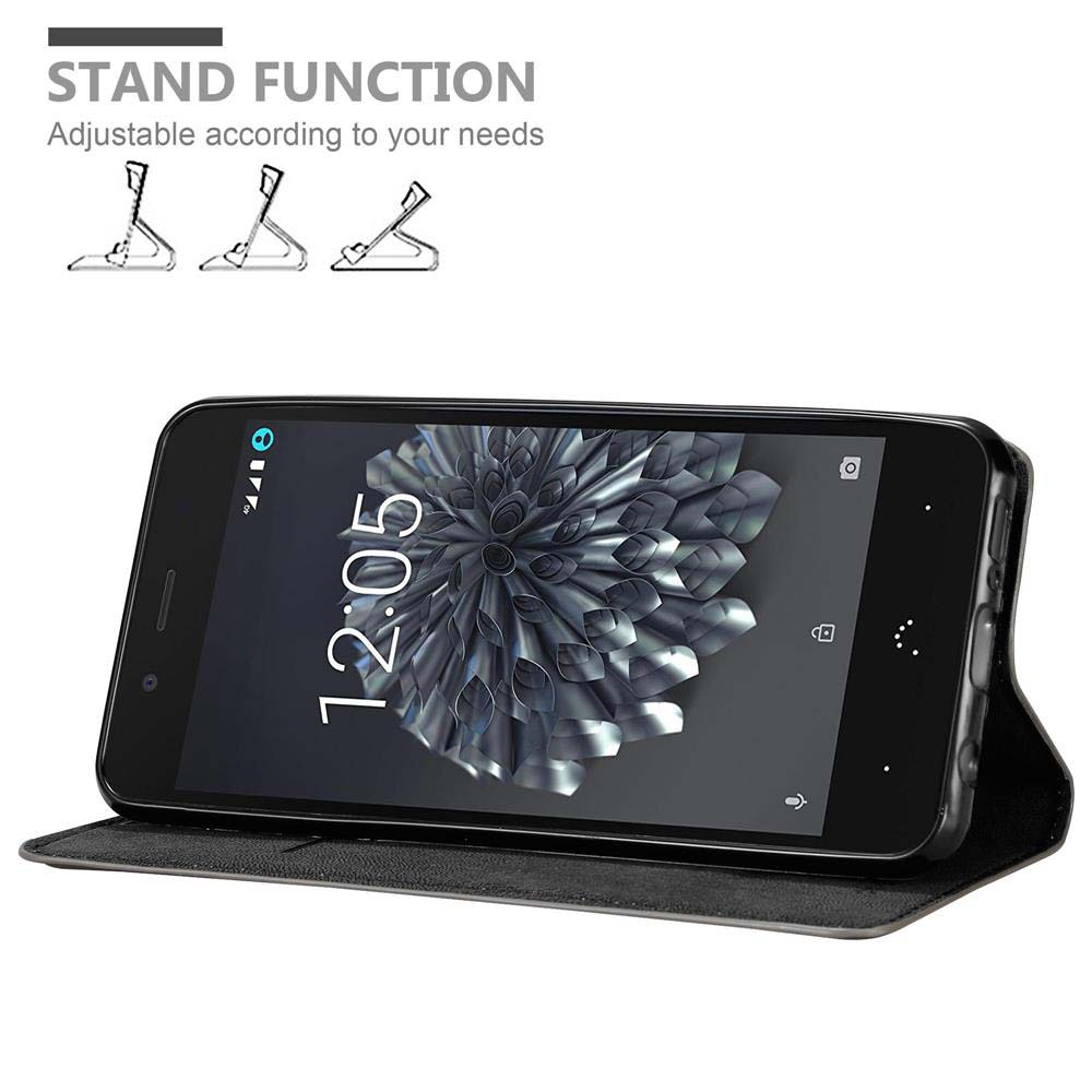 Teléfono en una funda negra. Gráfico de la función de soporte. La pantalla del teléfono está encendida.