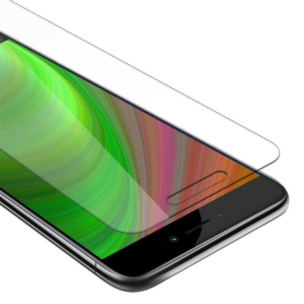 Pantalla de teléfono con protector de vidrio. La pantalla muestra patrones de color verde y naranja.