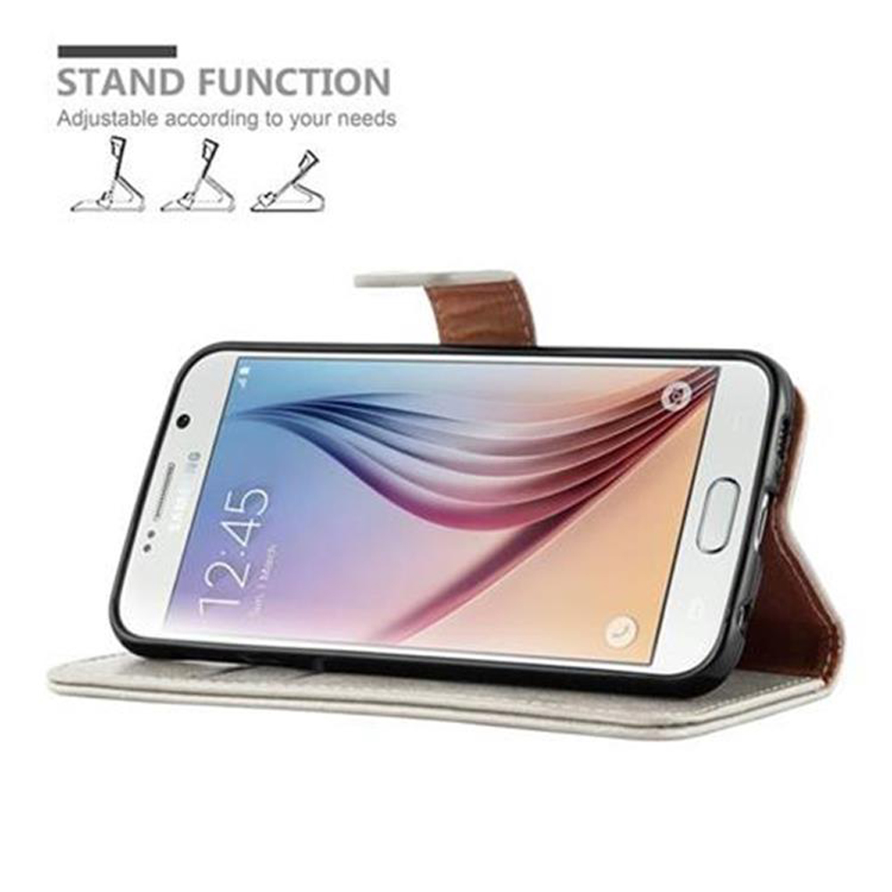 Telefono in una custodia, in piedi, con la funzione stand mostrata.
