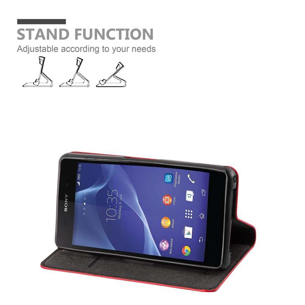 Teléfono en funda, abierto, apoyado. Se destaca la función de soporte. Teléfono negro con borde rojo.