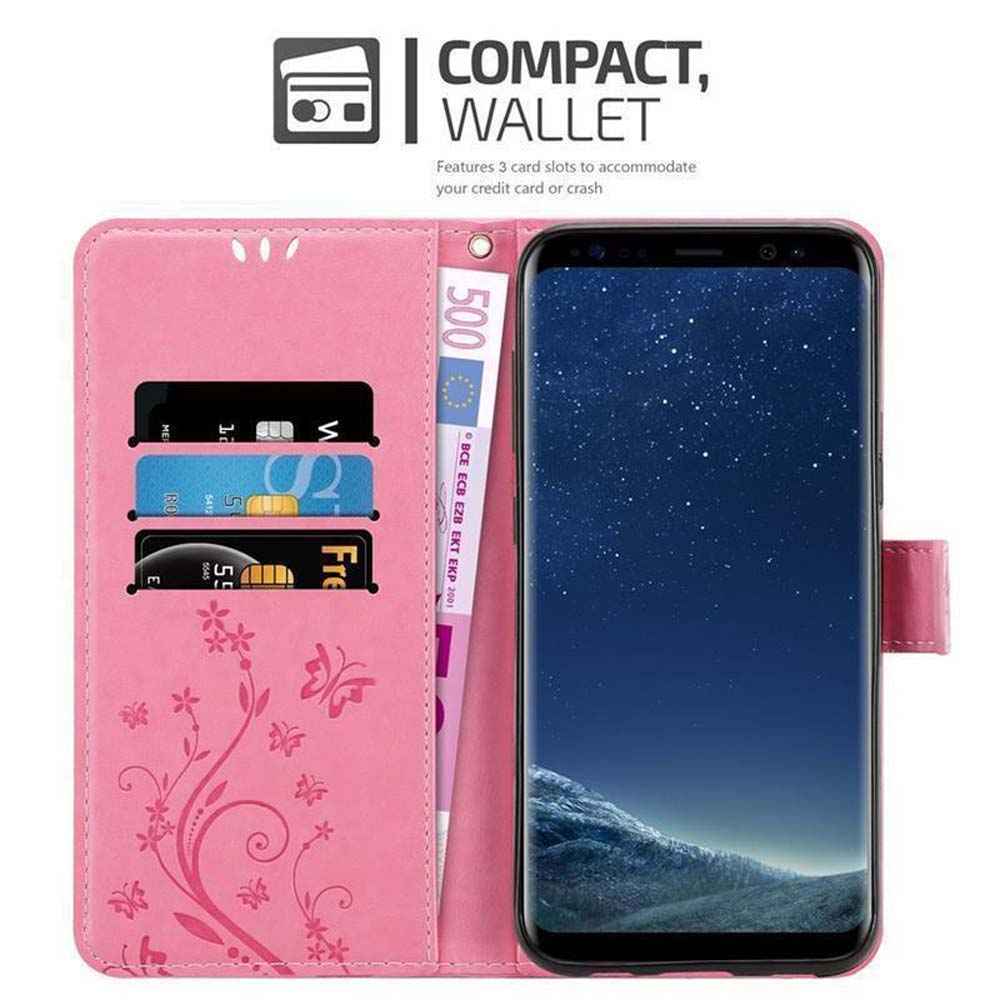 Custodia rosa con carte, denaro e telefono. Testo: Compatto, Portafoglio.