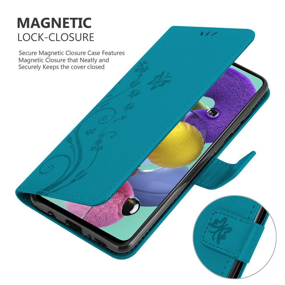 Custodia turchese, aperta con telefono dentro. Design floreale, chiusura magnetica.
