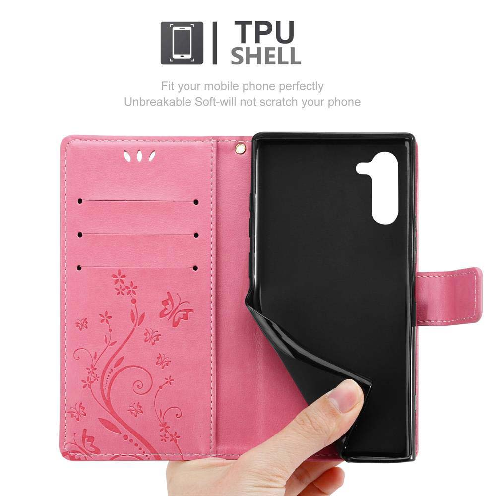 Eine rosa Handyhülle, offen, mit schwarzem Telefoninneren und rosa Blumendetails. Der Text 'TPU Shell' steht oben.