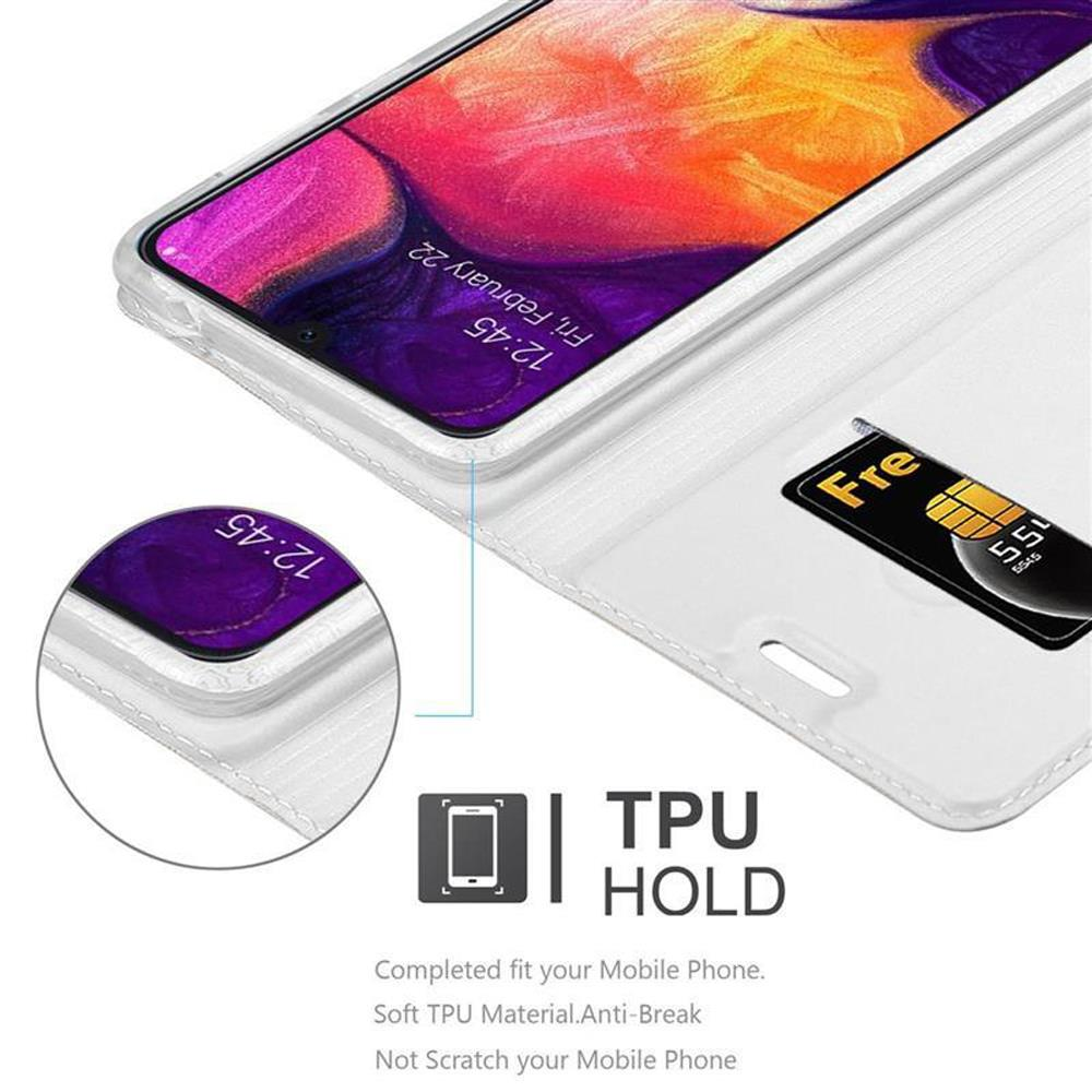 Telefono dentro la custodia bianca, che mostra l'ora. Una scheda SIM è nella custodia. Supporto TPU.