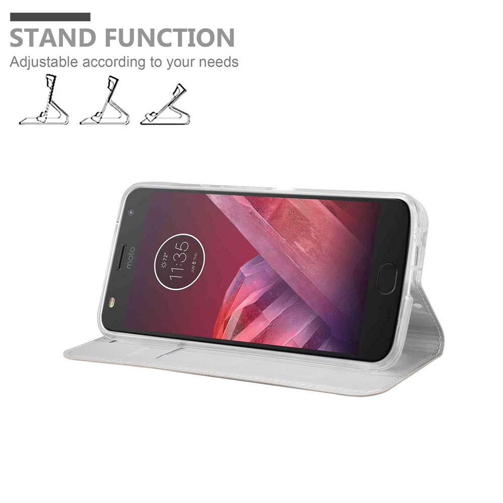 Un teléfono en una funda que puede actuar como soporte. La funda es blanca. Se muestra la función de soporte.