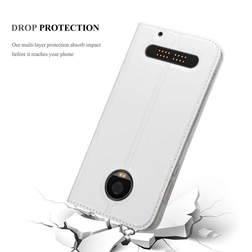 Funda blanca para teléfono, cerrada, en ángulo. Mostrando un teléfono dentro con suelo roto.