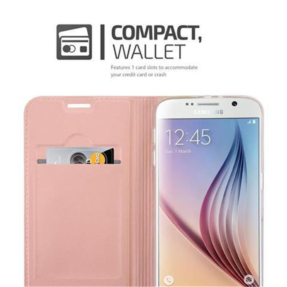 Custodia rosa per telefono con un telefono all'interno. Il telefono mostra l'ora. C'è uno slot per schede.