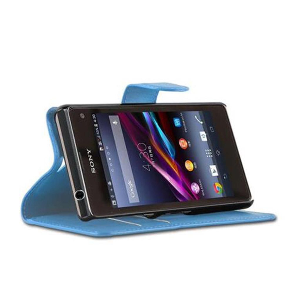 Custodia blu per telefono con un telefono nero all'interno. Il telefono mostra l'ora e le icone.