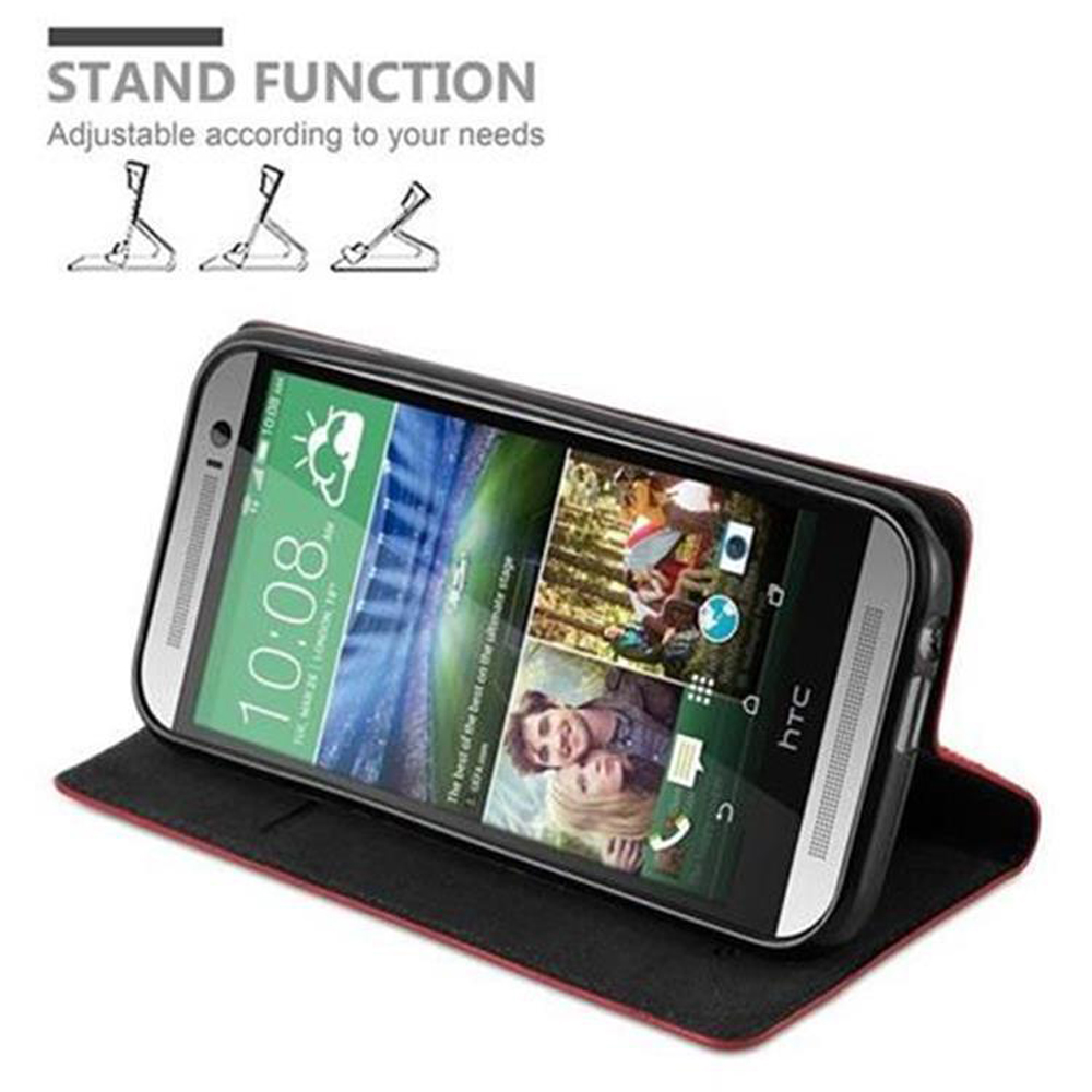 Teléfono en una funda apoyado. El teléfono muestra la hora y fotos. Gráficos muestran soporte ajustable.
