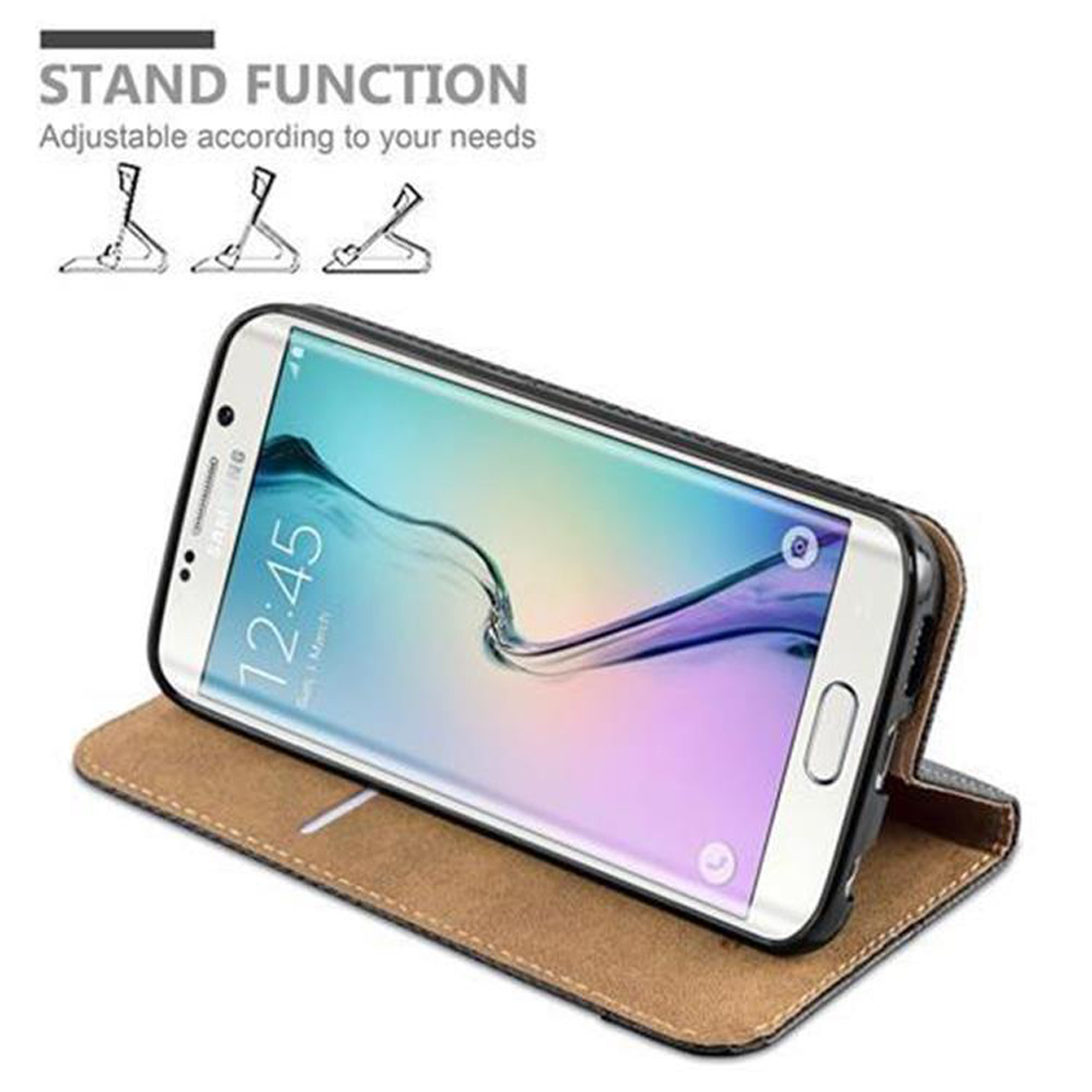 Telefono in una custodia, aperto, su sfondo bianco. Il telefono è angolato. Testo 'STAND FUNCTION'.