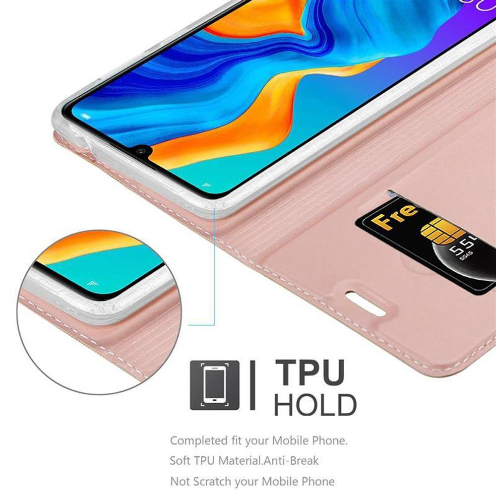 Custodia rosa per telefono con un telefono all'interno, che mostra una carta e le parole 'TPU HOLD'.