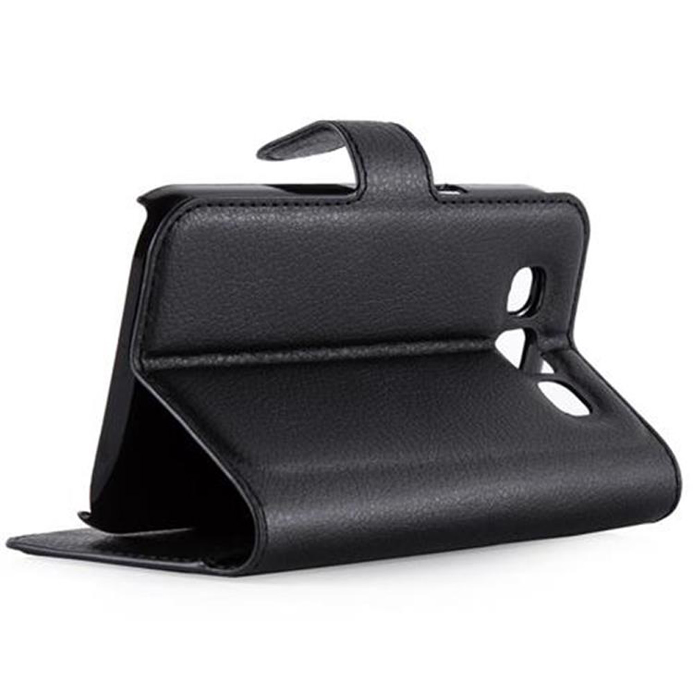 Schwarze Handyhülle mit Griff. Das Telefon ist schwarz. Die Hülle ist aus Leder. Weißer Hintergrund.