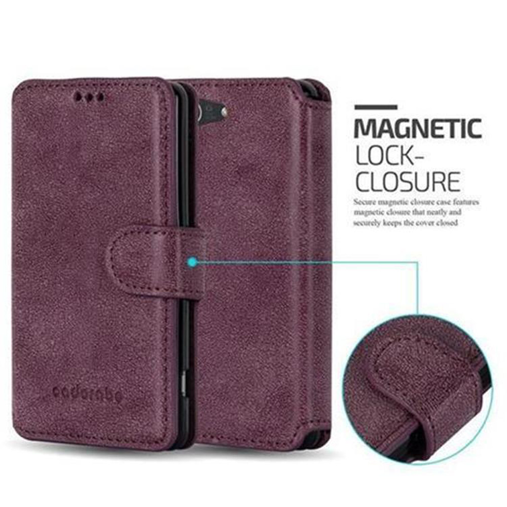 Una funda de teléfono púrpura cerrada con cierre magnético. A la derecha, un área circular ampliada.