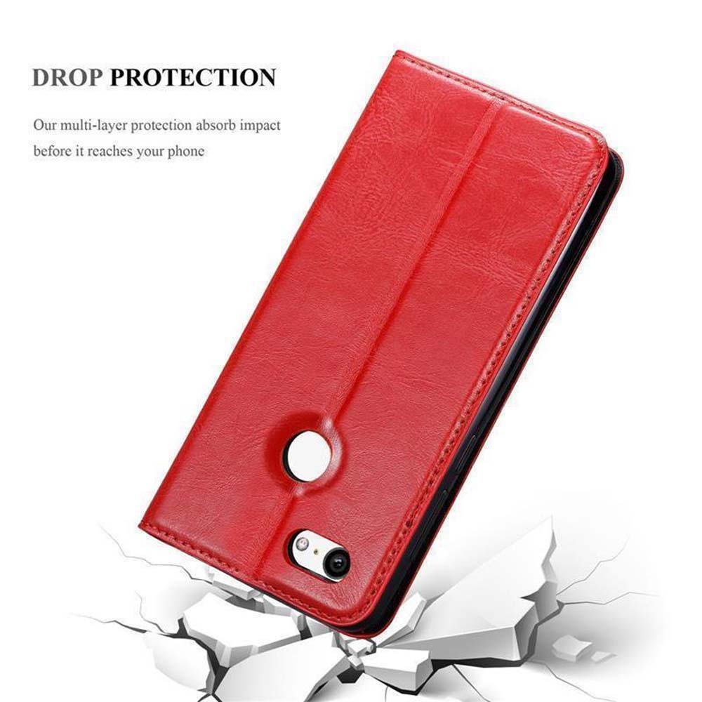 Una custodia per telefono rossa aperta, con un telefono e pezzi rotti. Lo sfondo è bianco.