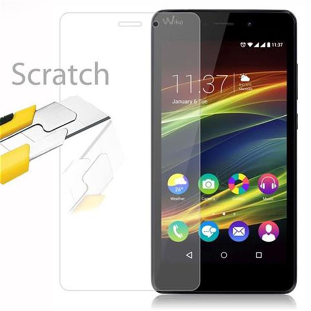 Telefono Wiko con protezione schermo. Un coltello giallo accanto alla protezione, pronto per staccarlo.