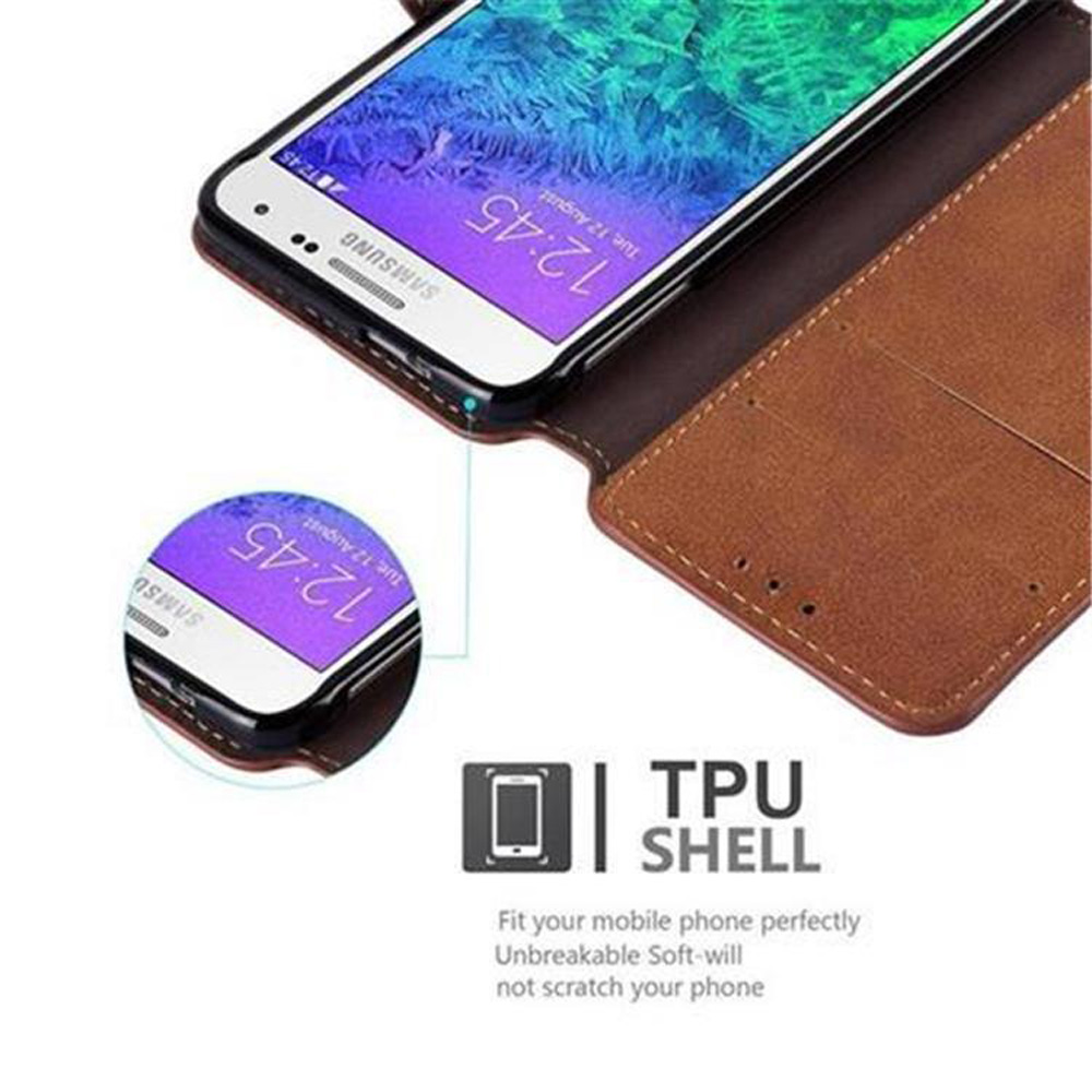 Téléphone dans un étui portefeuille marron, l'étui est ouvert montrant l'intérieur. TPU SHELL visible.