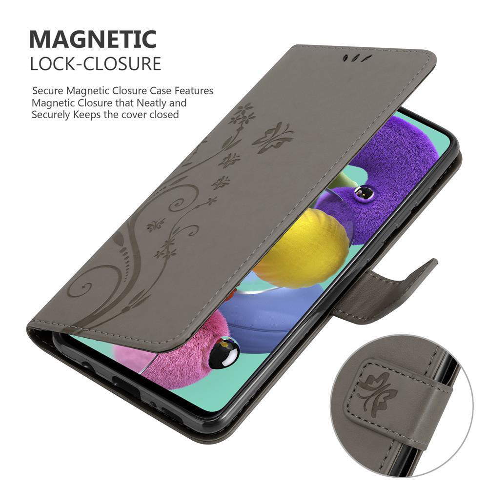 Custodia per telefono, con fiori. Blocco magnetico. La copertura è aperta, mostrando lo schermo. Sfondo grigio.