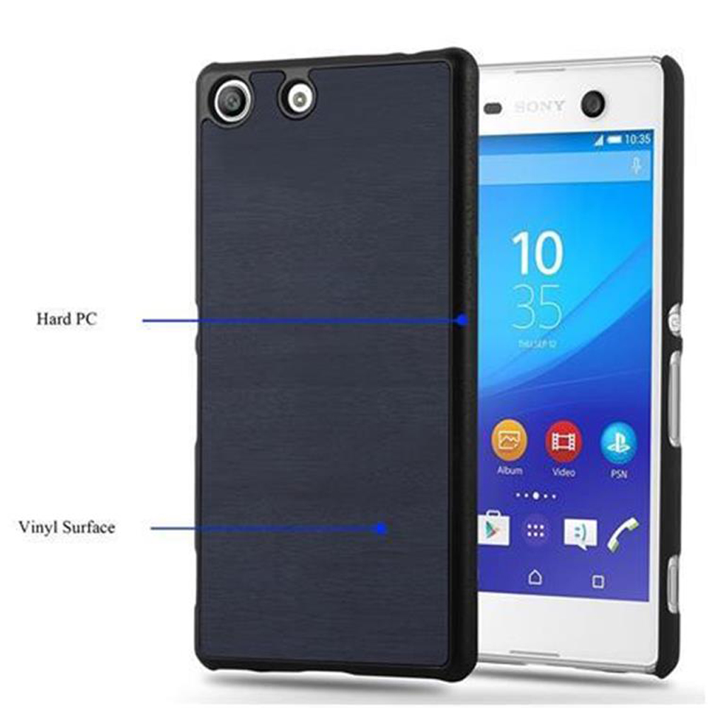 Se muestra una funda de teléfono negra con una superficie de PC dura y una superficie de vinilo con el teléfono.