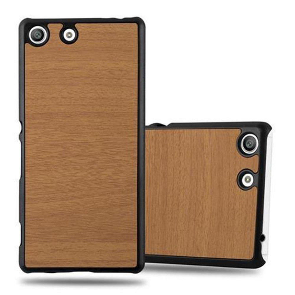 Fundas marrones de madera para teléfono, marco negro. Se muestran dos fundas.