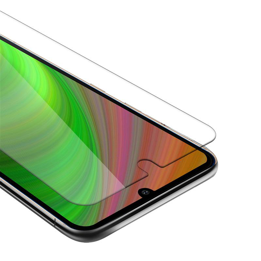 Uno schermo di smartphone con una protezione per lo schermo applicata. Lo schermo mostra uno sfondo astratto colorato.