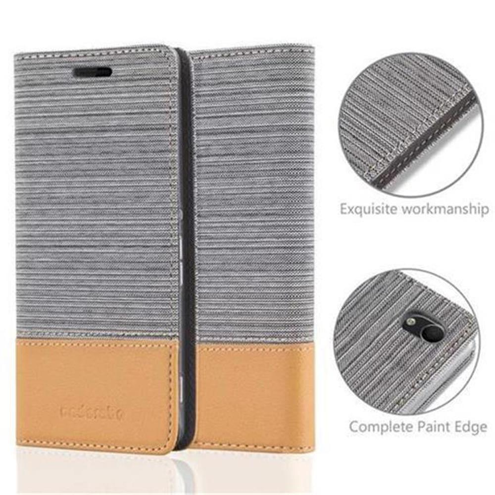 Una funda de teléfono, cerrada, con una combinación de colores gris y beige. La funda tiene un diseño texturizado. Se muestran detalles.