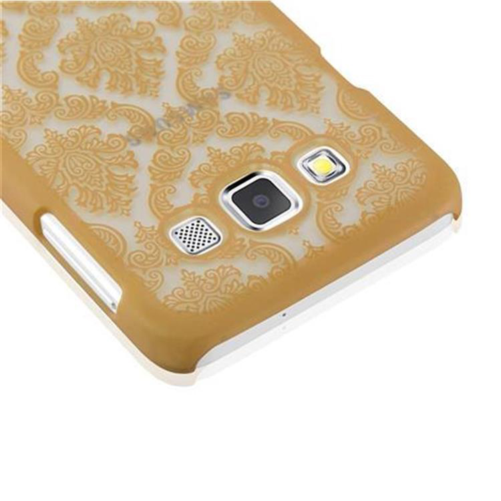 Custodia dorata per telefono con design floreale. La custodia ha fotocamera, altoparlante e flash.